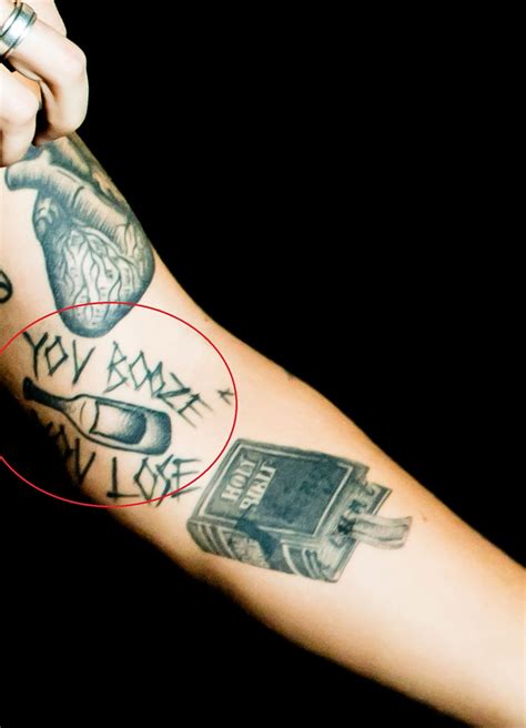 harry styles tattoos and meanings